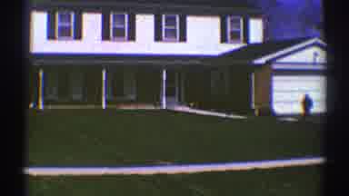 Clarendon Hills Illinois (1969): Kid Playing Outside A Big House When Dad Comes