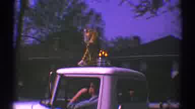 Clarendon Hills Illinois (1969): A Parade With Several People Dressed In Orange