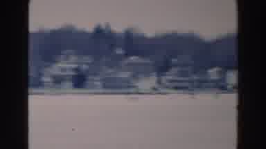 Tustin Wisconsin (1964): People Enjoying A Day In The Winter On A Frozen Lake