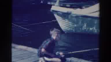 Tustin Wisconsin (1964): Little Boy Fishing On The Old Wooden Dock Cranky