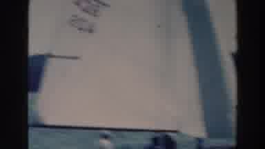 Tustin Wisconsin (1964): Some People On Sail Boats Sailing In The Sea