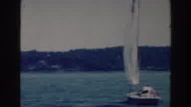 Tustin Wisconsin (1964): People Maneuvering Several Sailboats Close Together On A