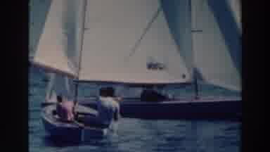 Tustin Wisconsin (1964): A Large Number Of Sail Boats Float Off The Coast On A
