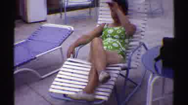 Nebraska (1969): Woman Sitting In Beach Chair