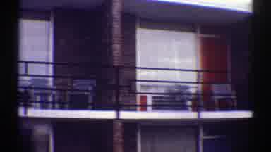 Nebraska (1969): An Apartment With Balcony There Are Chairs On The Balcony Kid