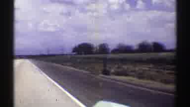 Nebraska (1969): Approaching View Of Highway And Grey Storm Clouds On A Cloudy