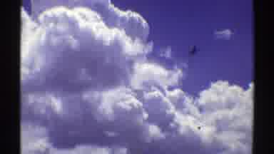 Nebraska (1969): Sky Airplane Blue Cloud Clear Road Sunny Pass Tiller Move