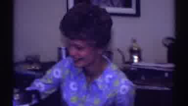 Clarendon Hills Illinois (1969): A Short Haired Woman Wearing A Blue Floral