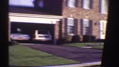 Clarendon Hills Illinois (1969): Two Adults And Three Kids Waving At A Camera In