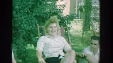 Michigan (1964): Several People Sitting And Watching Along With A Nun