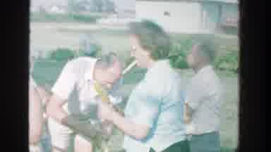 Michigan (1964): Elder Citizens Gather Around To Eat Yellow Corn