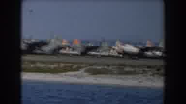 California (1961): Many Planes In A Row At The Edge Of The Sea