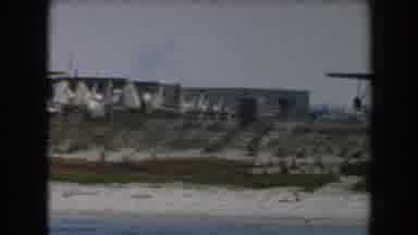 California (1961): View Of Green And Brown Structure On A Clear Day