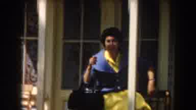 California (1961): Woman Walks Towards Bench Sits And Poses For Camera While