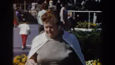 California (1961): A Woman And People And Small Child Are Seen Outside Outdoors