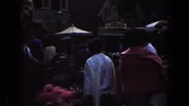 California (1961): Several People Walking In Fair With Several Colorful Flowers