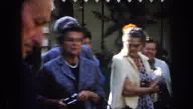 California (1961): Older Women Gathered Together In A Social Group Holding Flowers