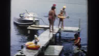 Wisconsin Dells Wisconsin (1954): Small Family On A Wooden Pier At Large Lake To