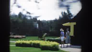 Wisconsin Dells Wisconsin (1954): Women Walking Through A Beautiful Flowering