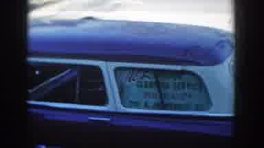 Wisconsin Dells Wisconsin (1954): Man Wearing Grey Hat Stands Next To Blue And