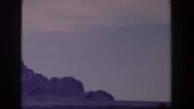 Texas (1958): Blue Landscape With Two Mountains And Some Trees And A Sign That