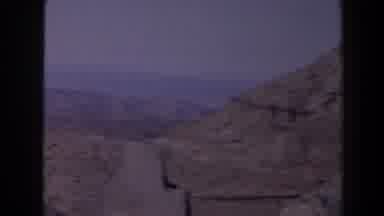 Texas (1958): View Of Brown Hill And Fields On A Cloudy Day