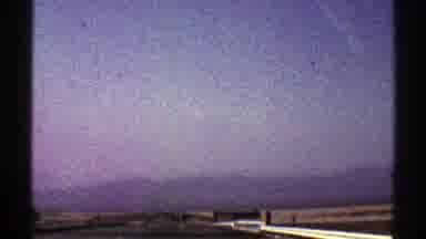 Nevada (1969): Driving On A Highway With Almost Perfectly Clear Skies And A Road