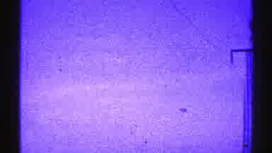 Nevada (1969): A Field With Many Electrical Posts Under The Blue Sky