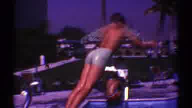 Nevada (1969): Boy Does Half Somersault Into Pool While Wearing Gray Bathing Suit