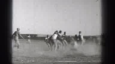 Washington (1938): Football Team Members Break From Huddle On A Sunny Day