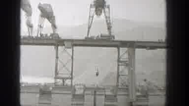 Washington (1938): Cranes Lowering Pieces Onto Bridge During Construction