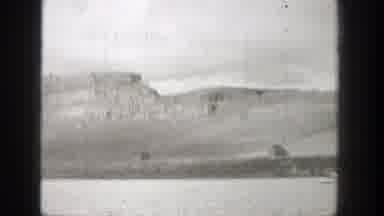 Washington (1938): Man Riding A Speedboat In Water Near The Mountains