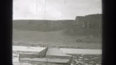 Washington (1938): A Motorized Vehicle Is Speeding Down The Road At A High Speed
