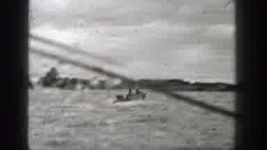 Washington (1938): Two People Riding In A Speed Boat In A Large Body Of Water
