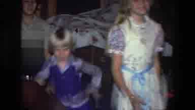 Saint Paul Minnesota-1971: A Blonde Girl And Boy Jump Up And Down In Celebration