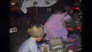 Saint Paul Minnesota (1971): Boy And Girl Enjoying Opening Lots Of Presents On