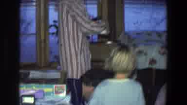 Saint Paul Minnesota (1971): Family Members Watching Children Opening Their