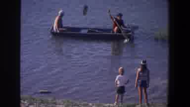 Saint Paul Minnesota (1971): Man Starts Boat As He Drifts Further From The