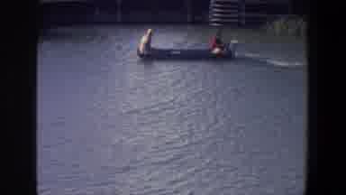 Saint Paul Minnesota (1971): Two People On Top Of Small Motorboat