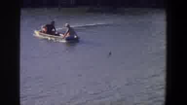 Saint Paul Minnesota (1971): Two People Riding In Motor Boat On Body Of Water On