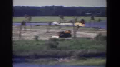 Saint Paul Minnesota (1971): Distant View Of White Speedboat Traveling On Lake On