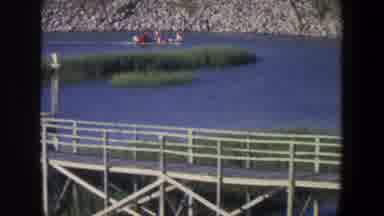 Saint Paul Minnesota (1971): A Powerboat Motors Through A Channel With Rocks On