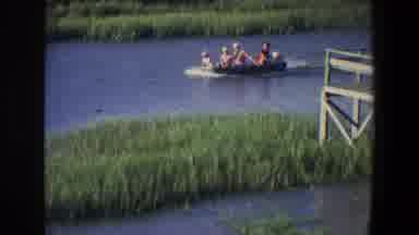Saint Paul Minnesota (1971): A Boat Carrying Four People And Powered By An