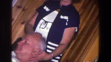 Saint Paul Minnesota (1971): Elderly Man Sitting Receiving Affection From A Woman