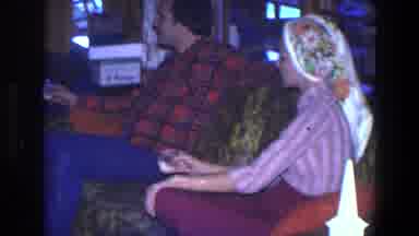 Saint Paul Minnesota (1971): Two People Chilling On A Sofa While Sharing A Drink