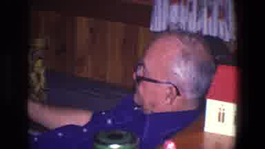 Saint Paul Minnesota (1971): Older Man And Younger Man Seated In Paneled Den With