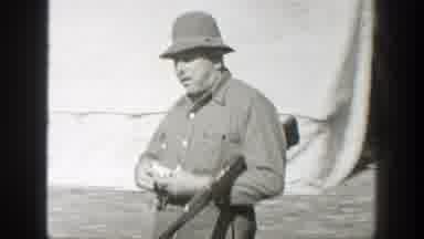California (1938): Army Guy Smoking A Cigar And A Man On A Horse
