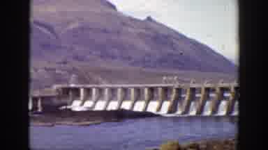 California (1938): National Scenario With View Of Mountain And A Dam To Control