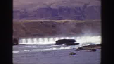 California (1938): A Large Body Of Water Next To A Mountain Covered In Shrubbery