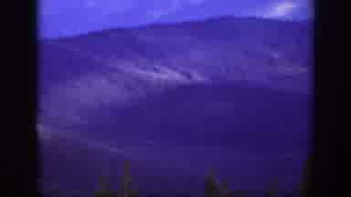 California (1938): Wide Panning Shot Of Sky Over Valley Of Trees And Mountains